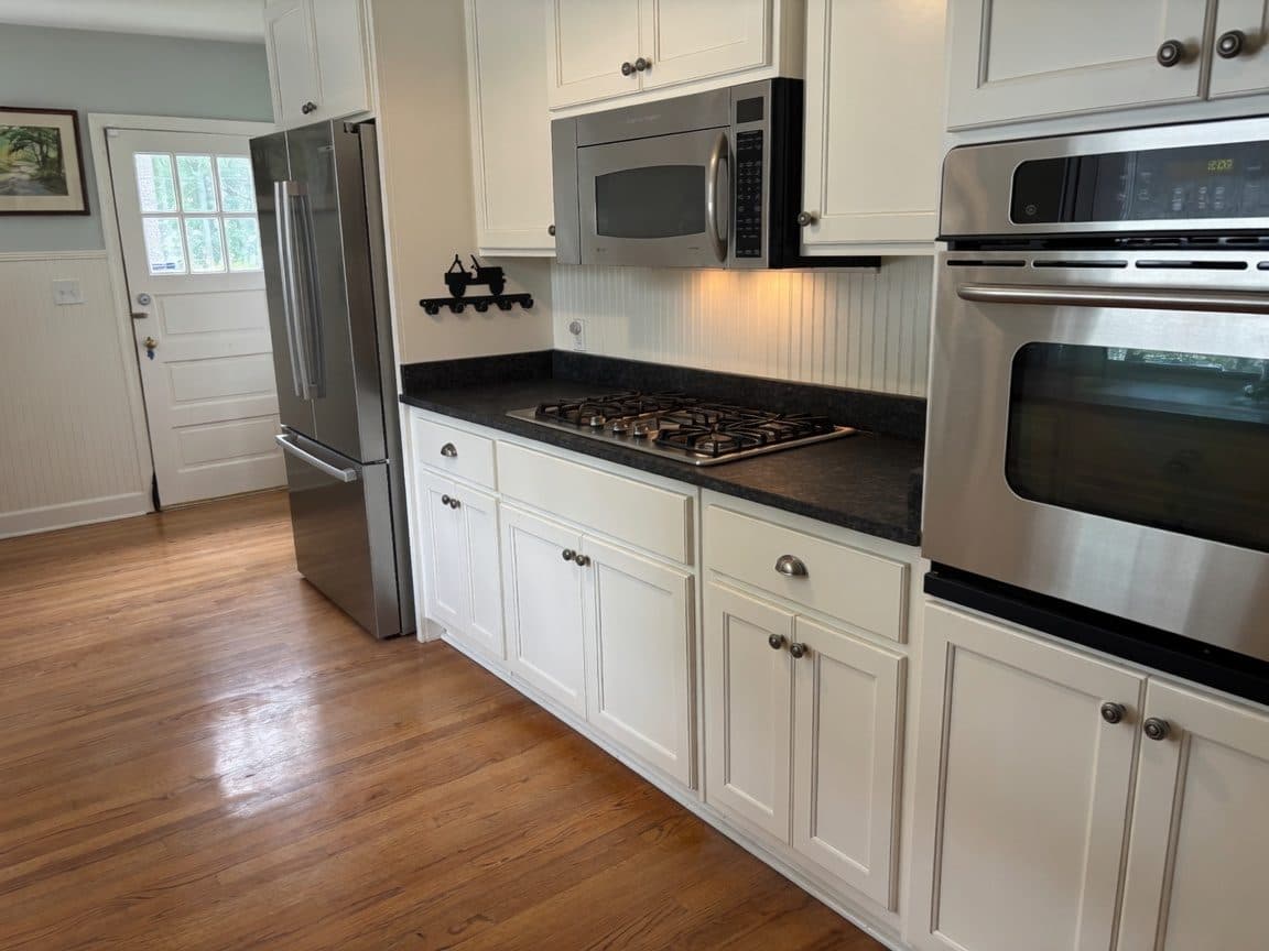 Dark speckled granite kitchen countertops