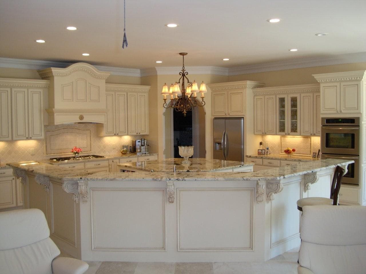 Kitchen with a Golden Splendor granite island and Delacatus granite counters
