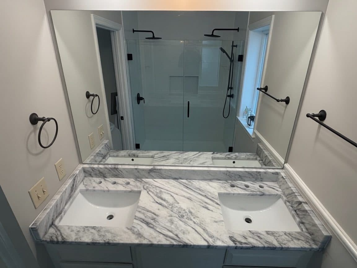 Marble double-sink bathroom vanity with makeup counter