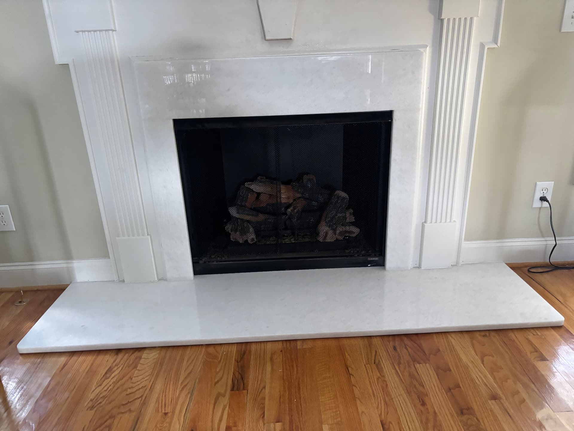 Hanoi White Marble fireplace surround and hearth